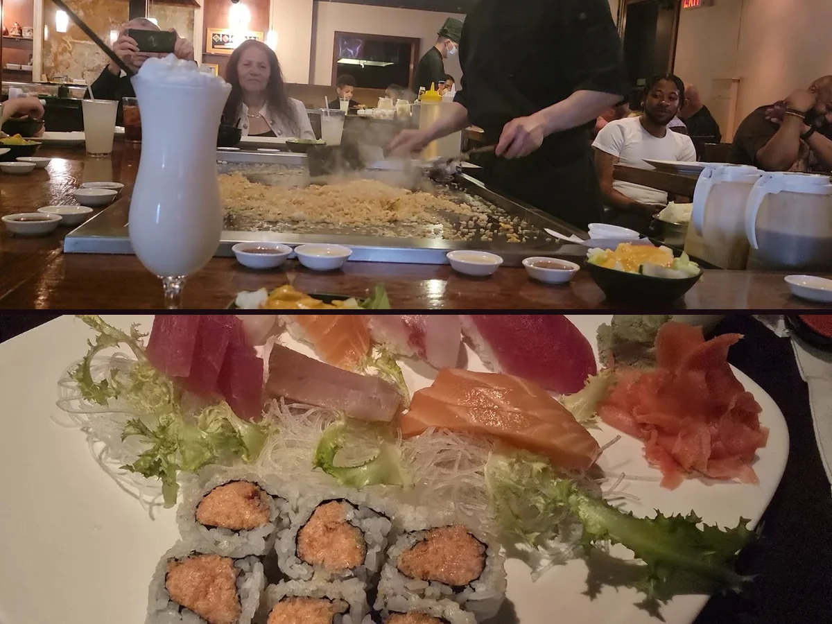 Hibachi grill with chefs cooking in front of diners.